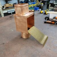 20220814_183040 Brasstonian AutoClears with Standard Rod Packs Leaf Debris Diverter Filter Screens Cleanouts for 4" by 3" Rectangular Copper Downspouts